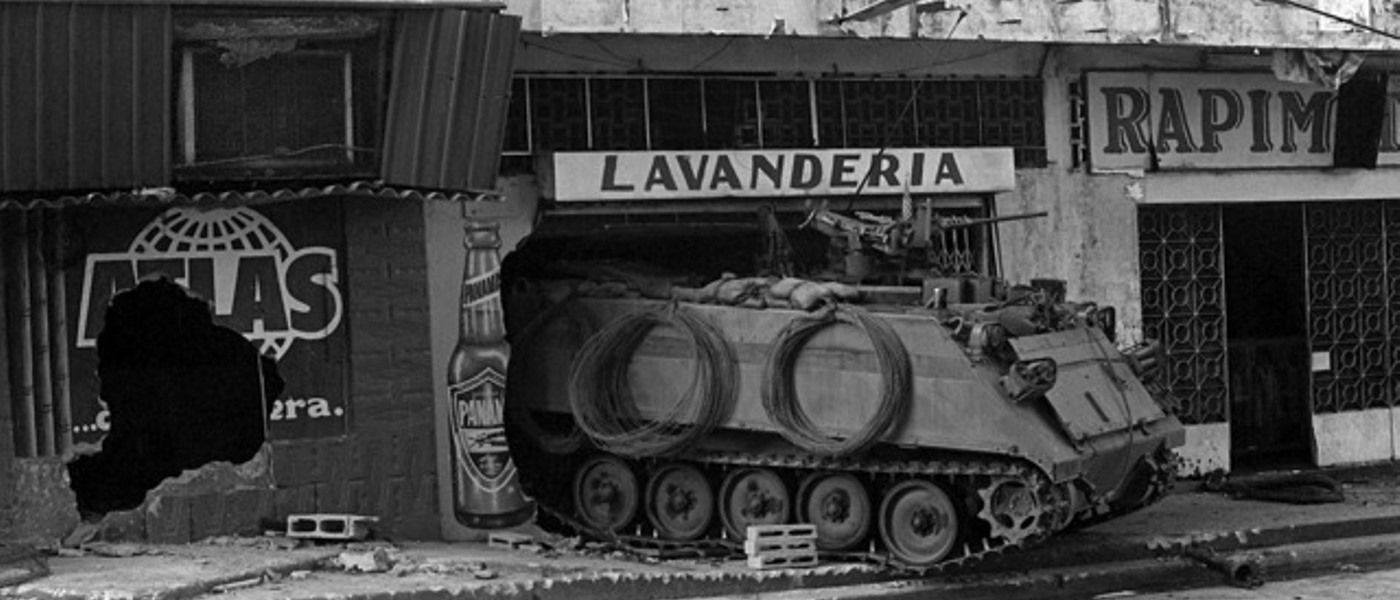 A U.S. Army M-113 armored personnel carrier during Operation Just Cause (NARA) https://nara.getarchive.net/media/a-us-army-m-113-armored-personnel-carrier-guards-a-street-near-the-destroyed-74472d